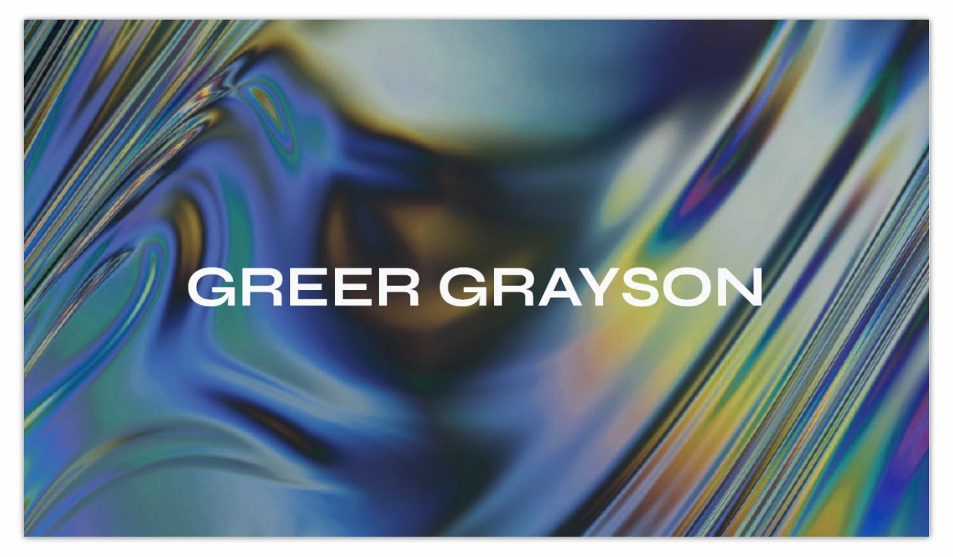 Greer Grayson business card featuring iridescent fluid art design